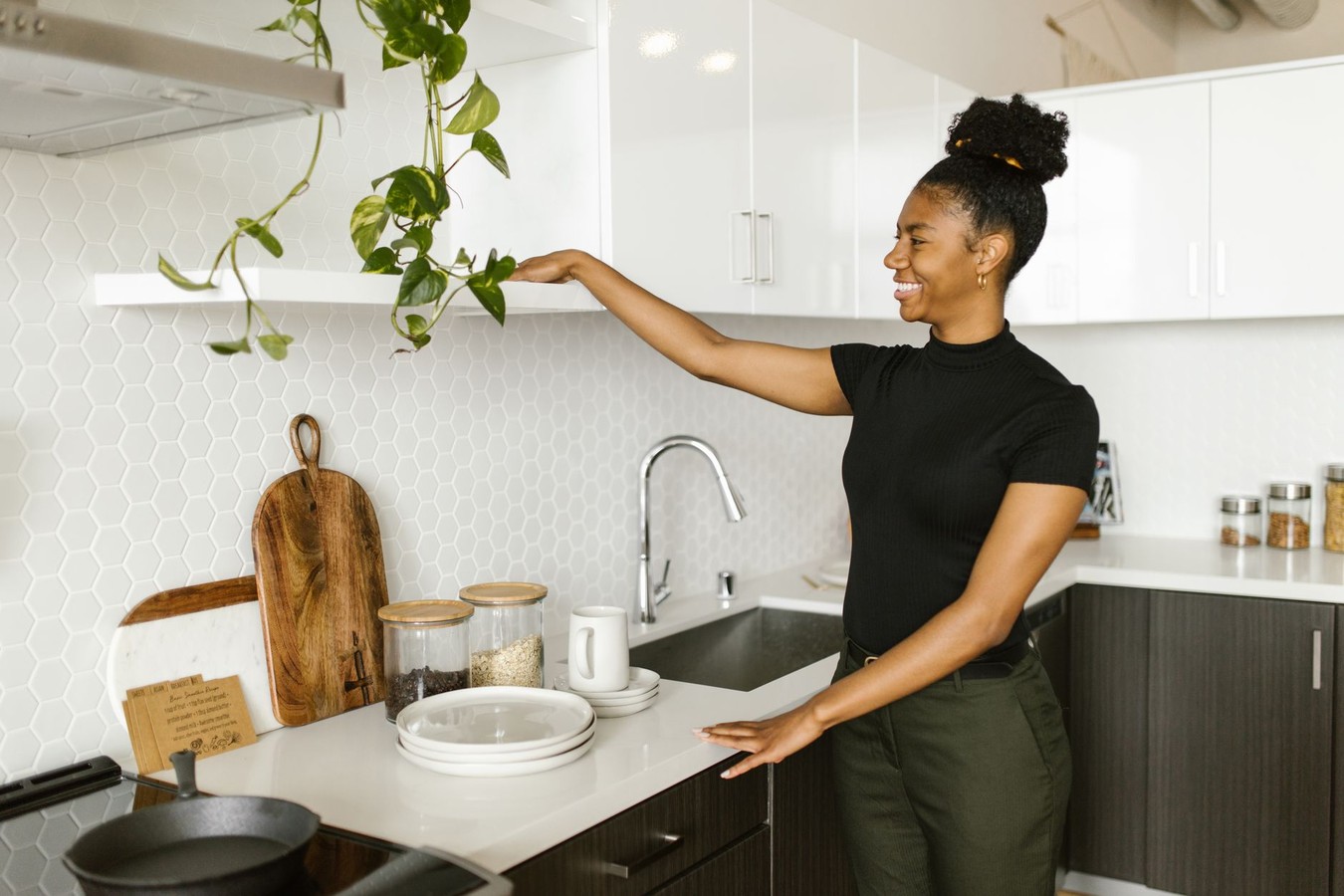 Home interior showing accessible kitchen layout with lowered shelving and ergonomic counter design